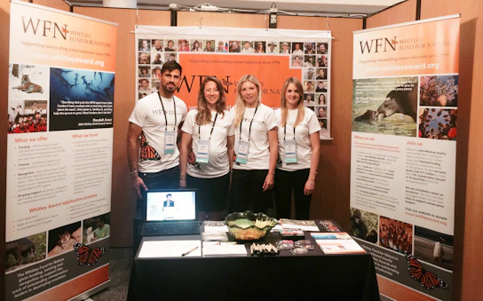 The WFN team (left to right: Harry, Georgina, Rebecca and Danni) in the WFN booth at the ICCB