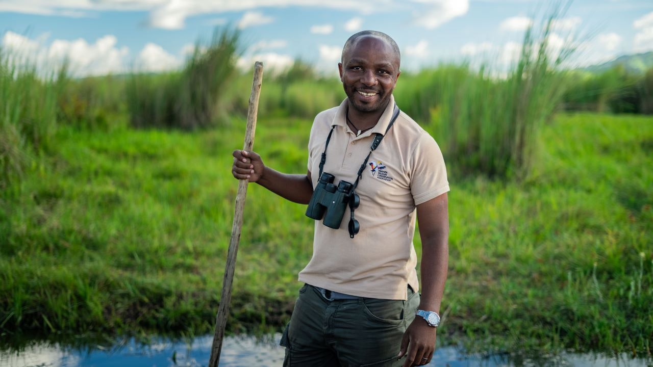 portrait of Olivier Nsengimana in a wetland environment in Rwanda